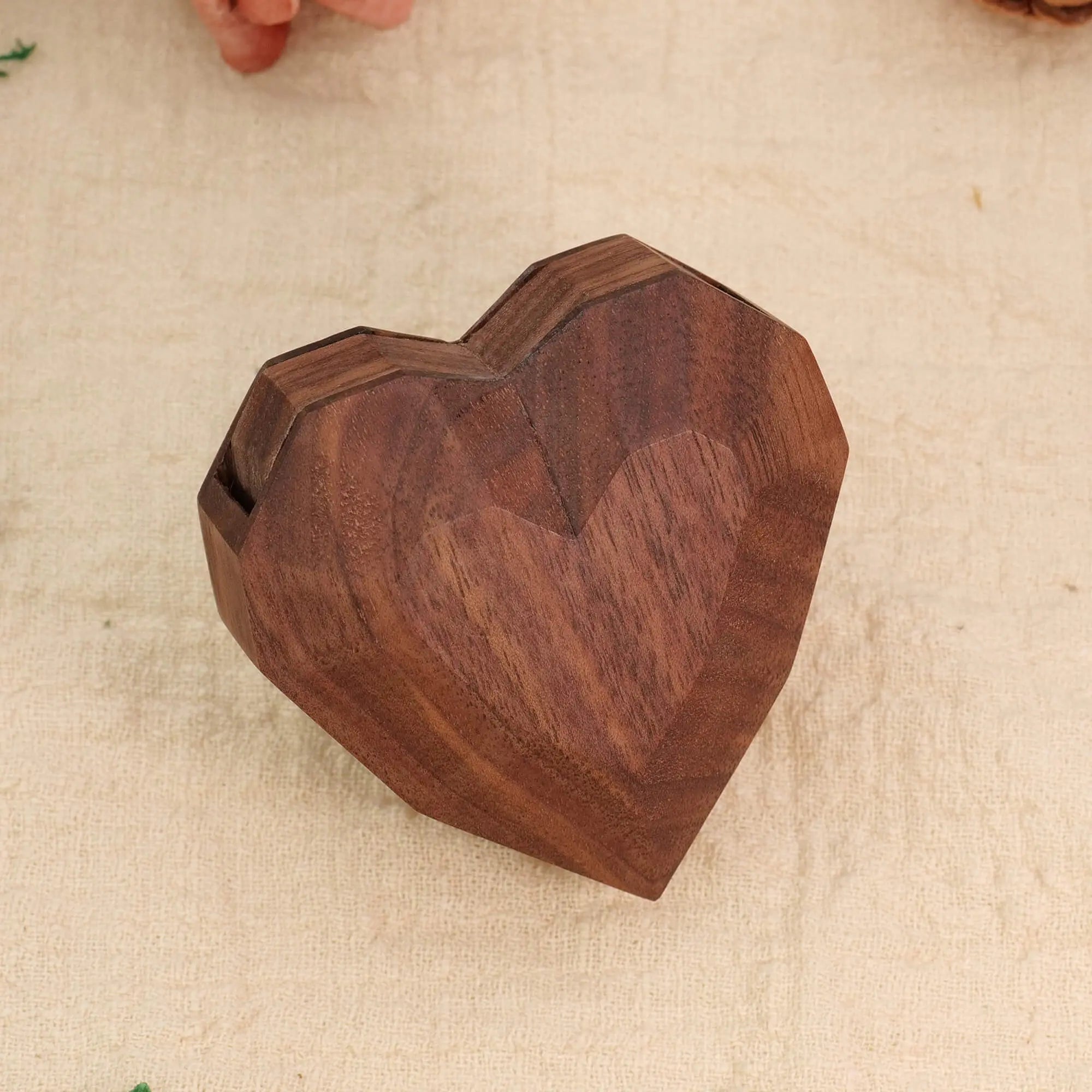 3D heart-shaped rotating ring box closed - front view showing geometric faceted heart design