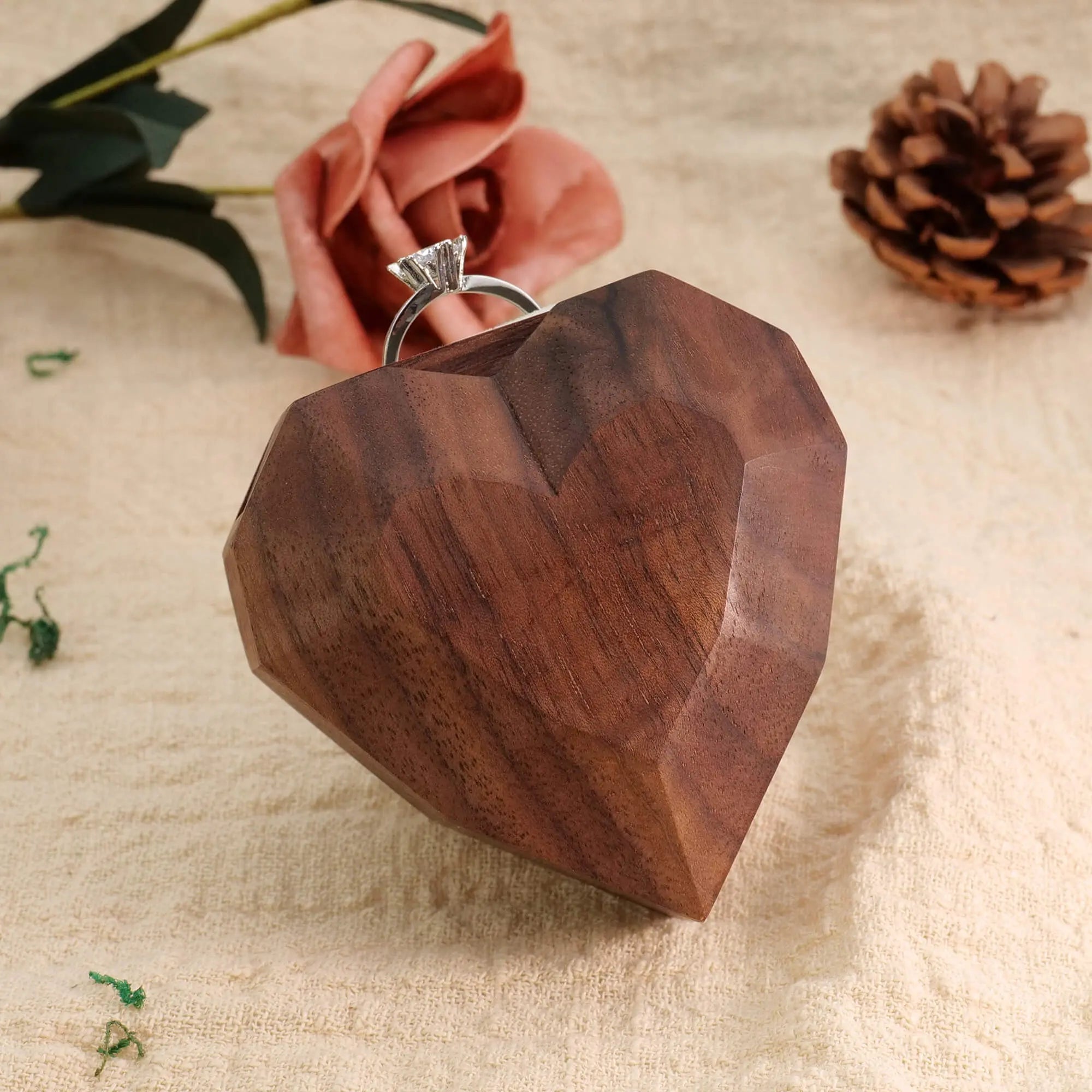 3D heart-shaped rotating ring box with ring flipped out - front view displaying sharp edges and distinct corners