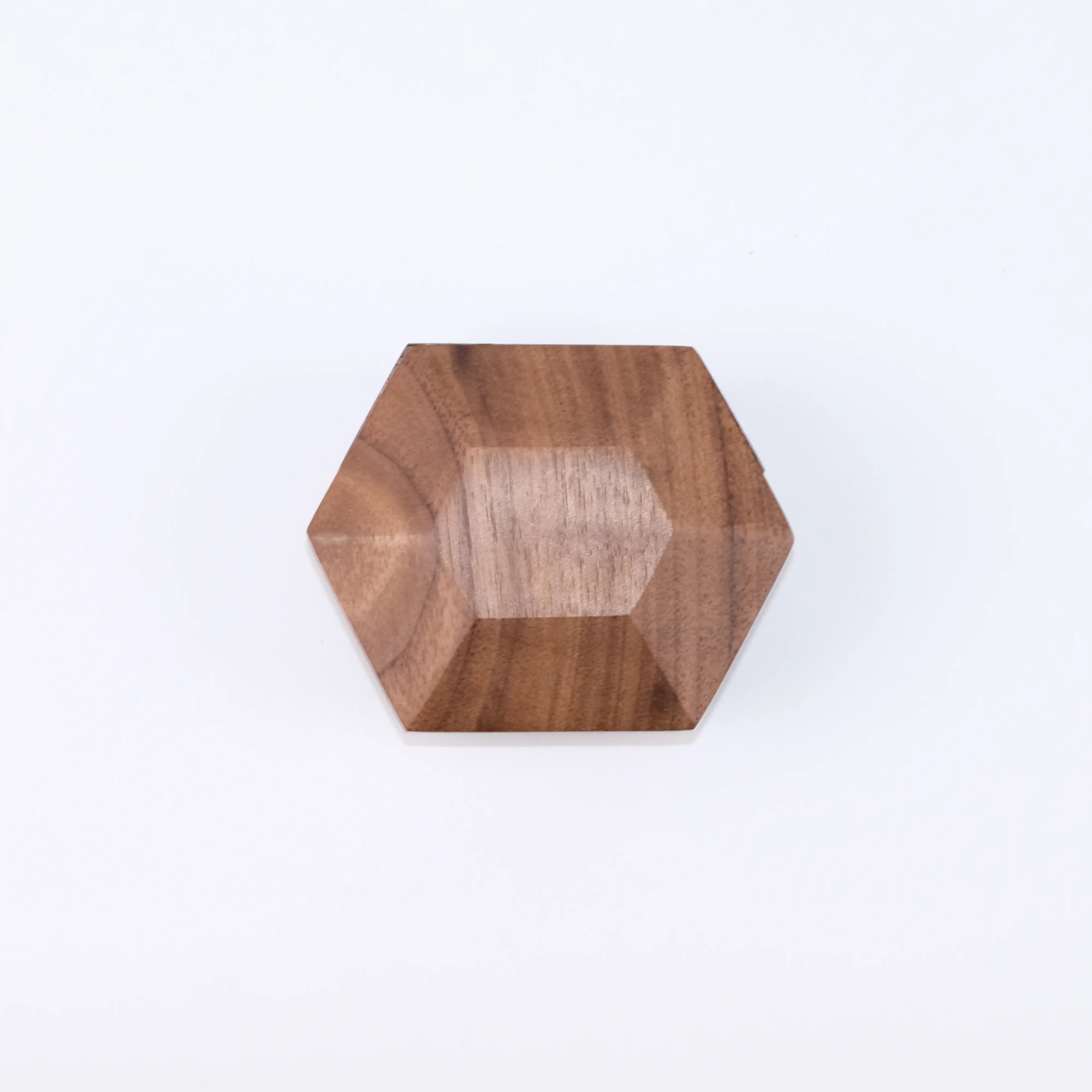 3D hexagonal rotating ring box closed - front view showing premium wood hexagonal geometric design