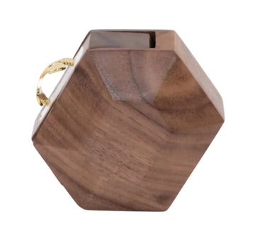 3D hexagonal rotating ring box tilted with ring flipped out - front view showing geometric faceted design and ring presentation