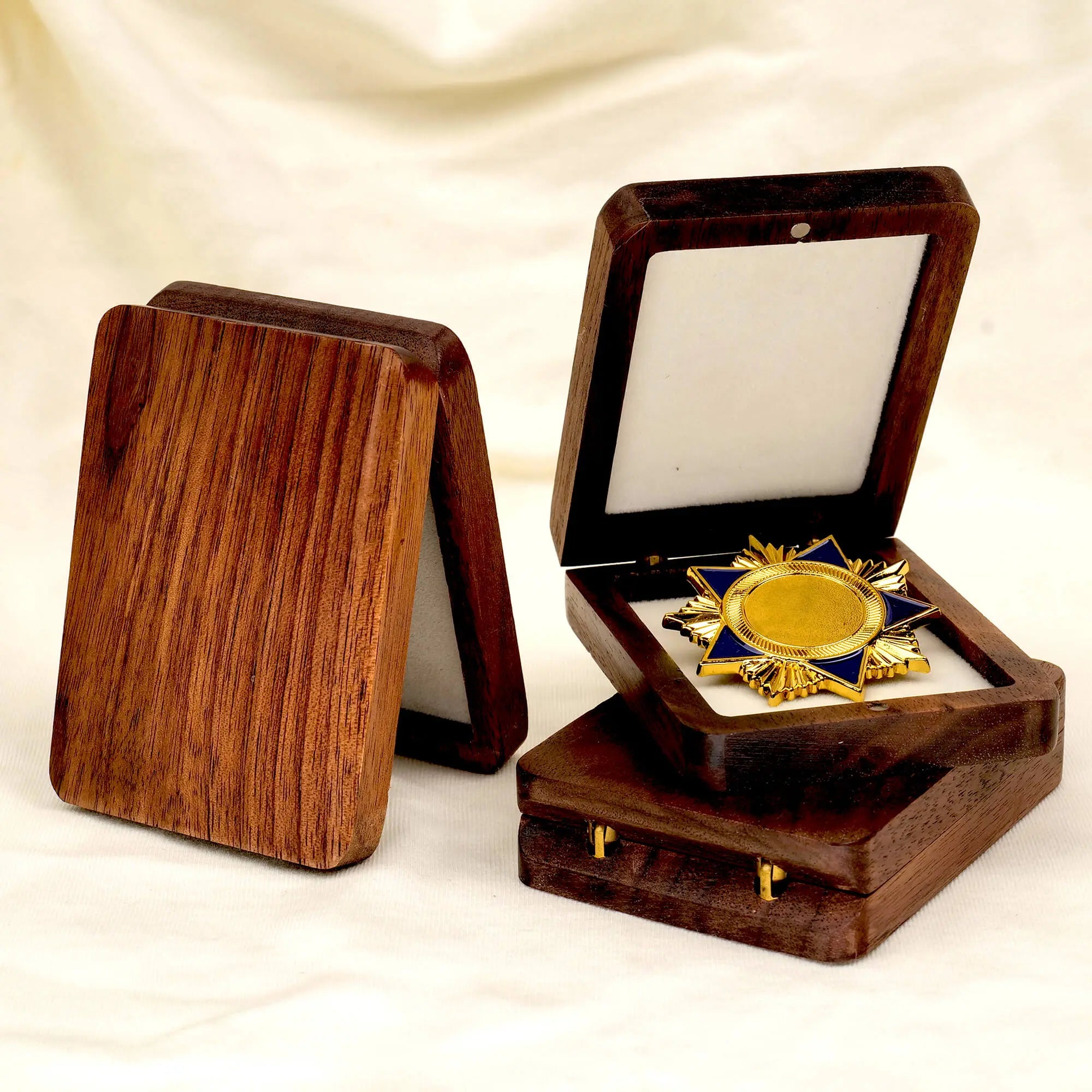 Three vintage wooden medal boxes display - product lineup showcase