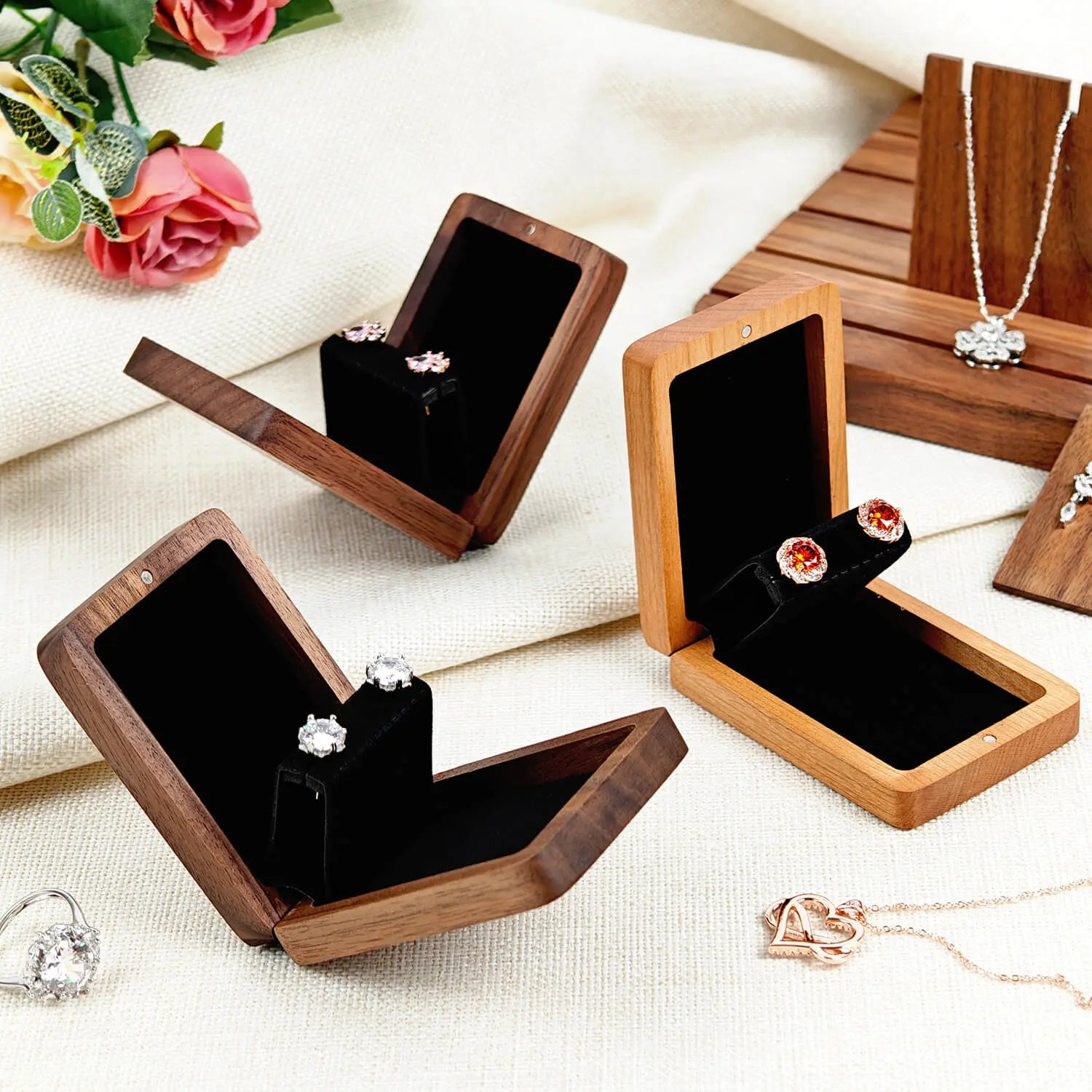 Three solid wood earring boxes uniform angle display - product lineup showcase